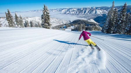 Aspen tussen vier iconische bergen.